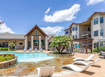 Swimming Pool With Relaxing Sundecks at Park Hudson Place Apartments, Bryan, Texas