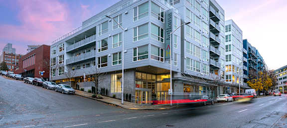 a large white building on a city street