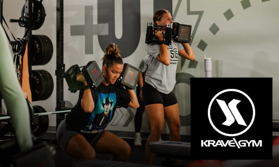 Two women working out at a Krave Gym.