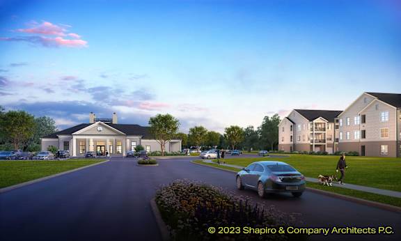 A car is driving down a street past a building with a dog on a leash. at Grays Creek Apartments, Cordova, TN, 38018