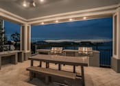 Thumbnail 43 of 54 - Poolside Grills at Dusk at Palms at Magnolia Park in Riverview, FL