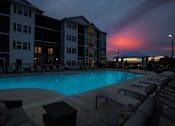 Thumbnail 40 of 54 - Swimming Pool at Dusk at Palms at Magnolia Park in Riverview, FL