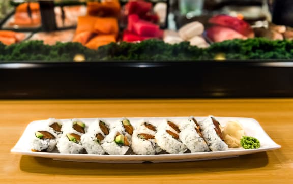 a plate of sushi on a table