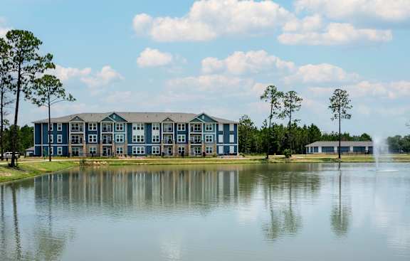 Modern Multi-story Building in front of a Lake