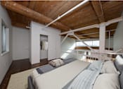Thumbnail 4 of 11 - Staged Loft Unit: Lofted Space