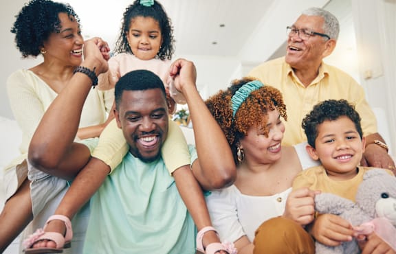 Lifestyle photo of a family smiling together
