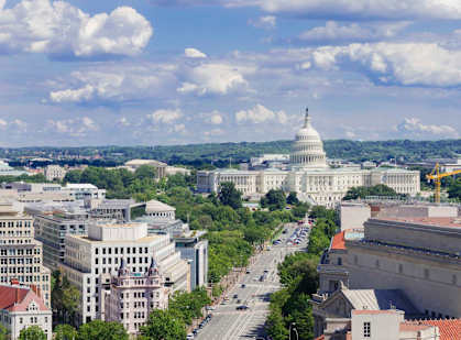 A view of the US Capitol building from a distance.
