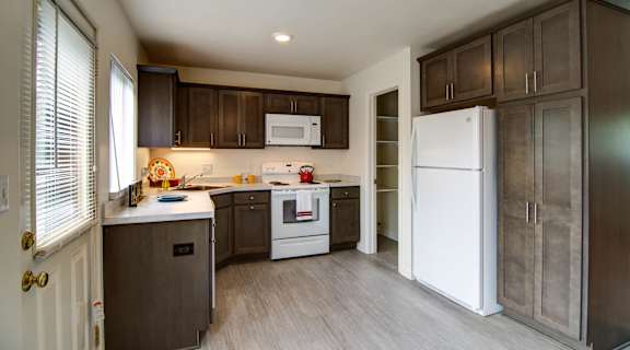 Remodeled kitchen in Lansing Apartments at Amber Square Apartments and Townhomes