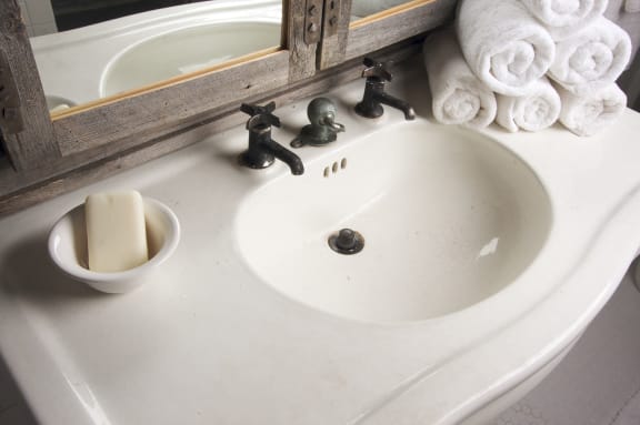 bathroom sink and towels