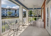 Thumbnail 11 of 26 - Patio at Magnolia Village Apartments, Jacksonville, FL