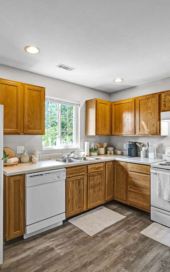 Fully Equipped Kitchen with White Appliances