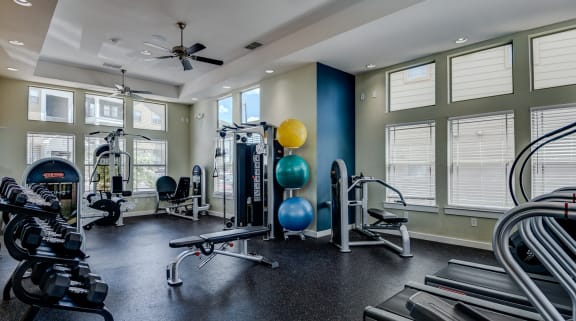gym with exercise equipment and windows at the grove