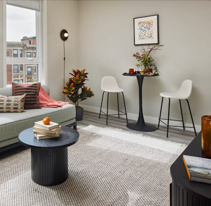 a living room with a couch and a table