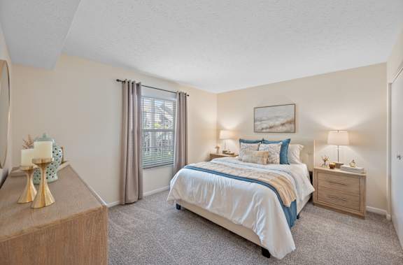 Balcony with a view of a lake and a deck with chairs at Normandy Club, Centerville, 45459