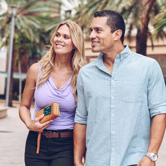 a man and a woman walking down a street