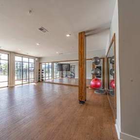 a large living room with wood floors and glass doors at Preston Ridge, Hickory, 28602