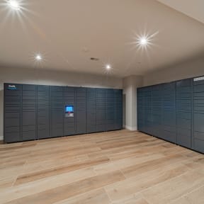 an empty room with blue lockers and a wooden floor at Preston Ridge, Hickory North Carolina
