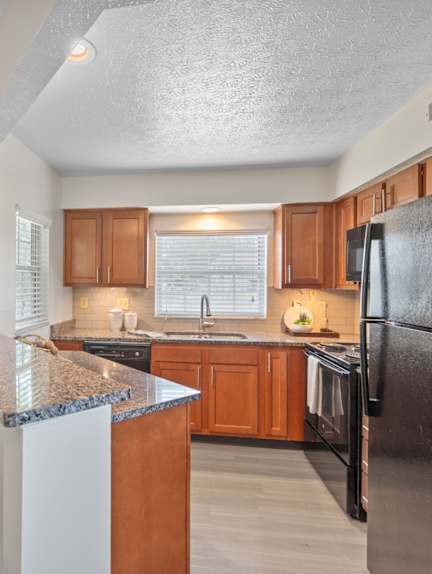 Kitchen with cabinets at Normandy Club, Centerville