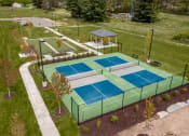 Thumbnail 3 of 11 - Pickle ball court at Quarry Apartments and Townhomes in DeWitt, Michigan