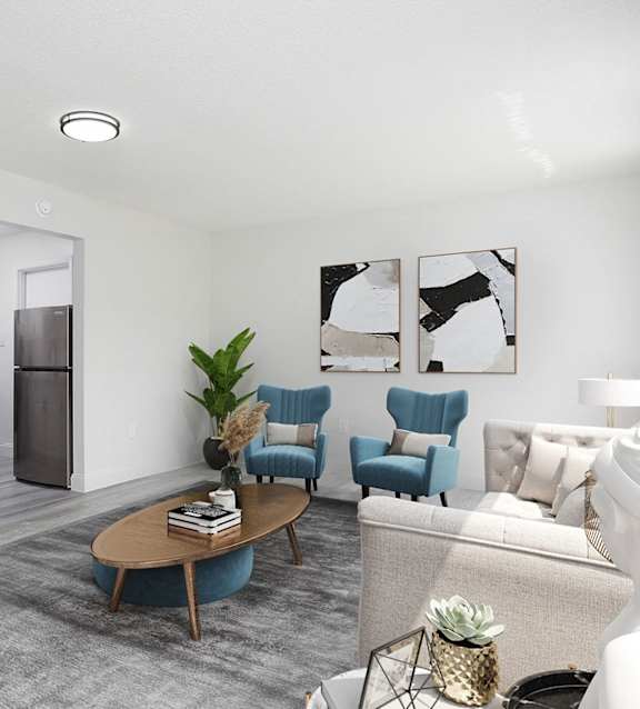 a bedroom with a bed and a kitchen and a living room