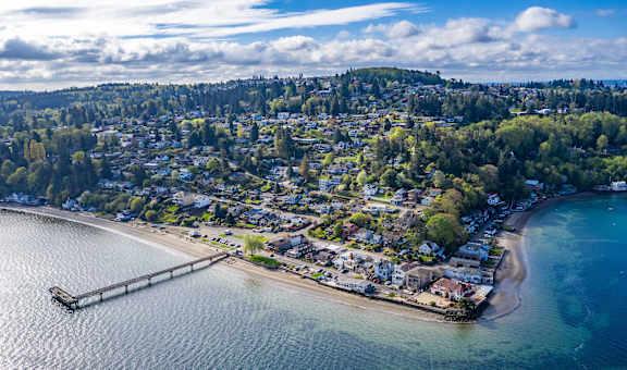 A small town is situated on a peninsula surrounded by water.