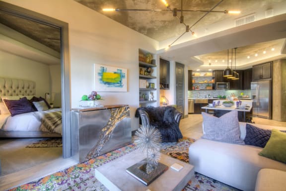 living room with couches and a carpet at The Case Building in Dallas, TX