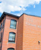 a brick building with a sign that reads glendale heights on the side