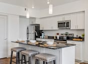 Thumbnail 2 of 20 - Equipped Kitchen with counter at City View St. George, St. George, Utah