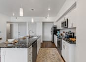 Thumbnail 9 of 20 - Kitchen with black stove at City View St. George, Utah, 84770