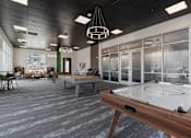 Thumbnail 25 of 42 - A foosball table is in the middle of a room with a ping pong table in the foreground. 605 Place Student Housing & Co-Living, Utah