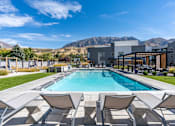 Thumbnail 3 of 74 - Lounging By The Pool at The Flats at Riverwoods, Provo, UT, 84604
