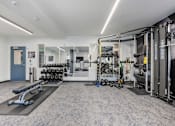 Thumbnail 6 of 74 - Gym with Variety of Equipment at The Flats at Riverwoods, Provo, Utah