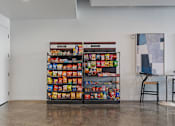 Thumbnail 25 of 62 - A display of snacks and drinks in a room.