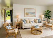 Thumbnail 2 of 8 - A living room with a white couch, two chairs, and a table with a blue bowl on it.