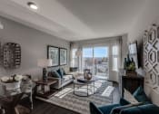 Thumbnail 7 of 8 - Lux Apartments Bellevue living room and sliding glass door to private outdoor balcony