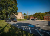 Thumbnail 30 of 30 - Clermont Apartments Parking Lot