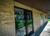 Thumbnail 19 of 26 - Carriage Park Apartments Fitness Center Entry