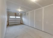 Thumbnail 7 of 11 - Garage parking at Quarry Apartments and Townhomes in DeWitt, Michigan