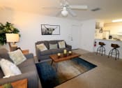 Thumbnail 10 of 17 - Ridgepointe Living Room and Kitchen