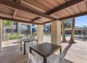 Thumbnail 18 of 21 - Oakridge Apartments - Pool Lounge Area