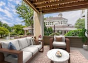 Thumbnail 5 of 30 - Outdoor Lounge at The Apartments at Tamar Meadow, Columbia