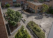 Thumbnail 4 of 7 - an aerial view of a courtyard with trees and buildings
