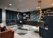 Thumbnail 19 of 19 - a lobby with couches and chairs and a wall with a tapestry