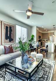 a living room with a couch and a coffee table at Elevation at the Village, Gilbert, AZ