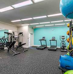A spacious gym with a variety of equipment at Austin Chase Apartments, Macon