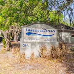 A sign for Lakewood Terrace with a wheelchair symbol indicating accessibility.