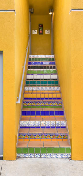Exterior view of The Edge with a staircase leading to the second floor.