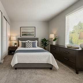 A room with a sliding glass door and a wooden floor.