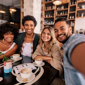 A group of friends taking a selfie in a bar.at Century Apartments, Memphis Tennessee