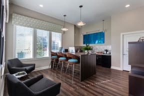 an open floor plan with a kitchen and living room